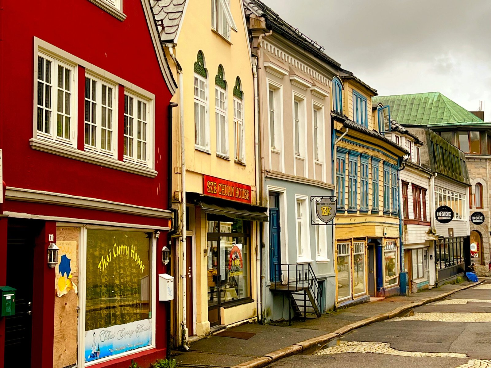 The historic Bryggen waterfront and harbor in Bergen, Norway at sunset